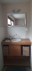 a bathroom with a sink and a mirror at Clos Du Ry De Snaye in Beauraing +24 photos
