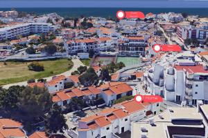 an aerial view of a city with buildings at #268 Luxury Villa Pool & Views in Albufeira