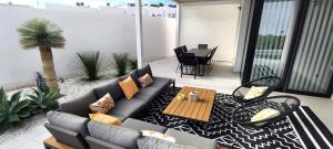a living room with a couch and a table at Villa Mojacar in Mojácar