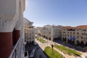 a view of a street in a city with buildings at vintege style apartment in Thessaloniki