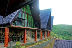 a building with solar panels on the side of it at The Rusty Villa in Hatton +28 photos