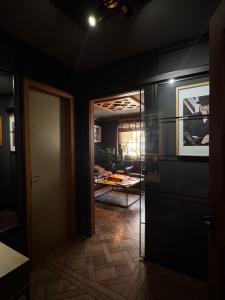 a hallway with a door leading to a living room at Chalet MOOS in Todtmoos