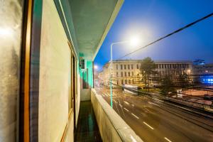 a view of a city street at night from a window at Pit Stop Centrum in Ploieşti