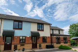 a brick house with black windows at 2 Bed in Newton oc-bow124 in Porthcawl