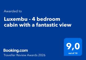 a blue sign with the words livburn bedroom cabin with a fantastic view at Luxembu - 4 bedroom cabin with a fantastic view in Gol