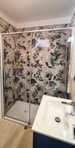 a bathroom with a shower and a sink at Borgo Marchetti in Camerano +35 photos