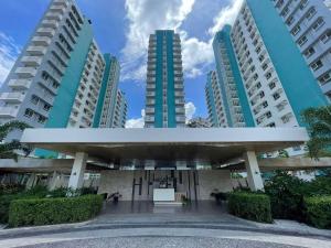 a view of a building with tall buildings at Bacolod Condo CASA LEA in Bacolod