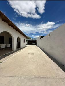 an empty courtyard of a house with a building at Mab departamento in Colorado River