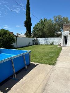 a pool in the backyard of a house at Mab departamento in Colorado River
