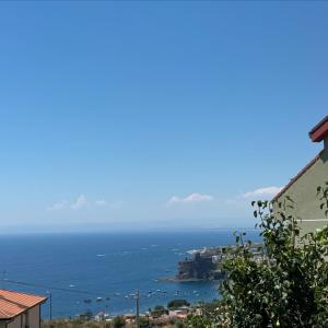 a view of the ocean from a house at A montagna e u mari home in Aci Castello