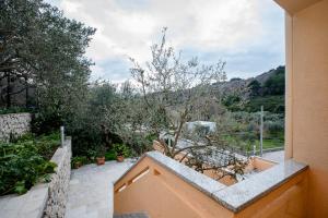 a view from the balcony of a house at Jednosobni apartman Dionis in Mundanije