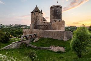 an old castle with a bridge and a tower at APARTAMENT z widokiem na ZAMEK 10 min od KATOWIC in Będzin