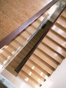 an overhead view of a stair case with a wooden railing at Hotel Ngân Lan in Ga Tam Quan