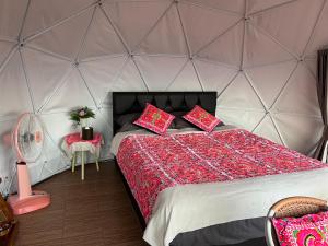 a bedroom with a bed in a tent at ม่อนสาเคียงดาว in Ban Thung Phan Ha +25 photos
