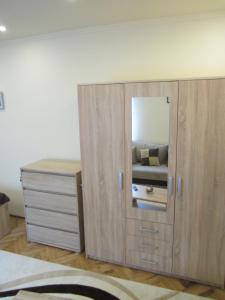 Posteľ alebo postele v izbe v ubytovaní Dudi Apartman
