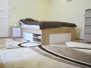Posteľ alebo postele v izbe v ubytovaní Dudi Apartman