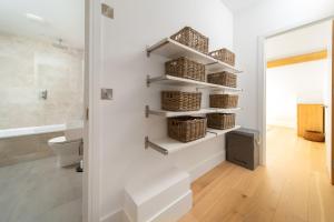 a bathroom with baskets on the wall at Tors Park in Lynmouth +130 photos