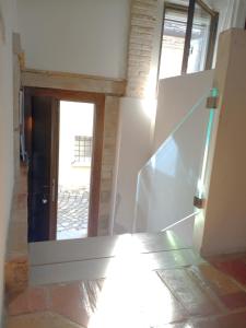 an empty room with a staircase and a door at CasAlice Room & Breakfast in Santarcangelo di Romagna +36 photos