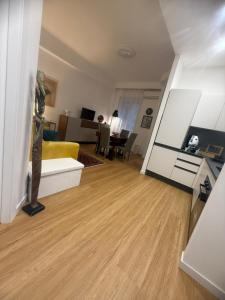 a living room with a couch and a table at via Minzoni 26 in Cosenza +19 photos