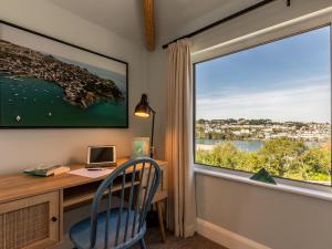an office with a desk and a large window at 5 Bed in Fowey oc-93849 in Polruan