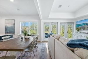 a living room with a couch and a table at Famiy and Pet friendly, close to Wharf, pool in Orange Beach