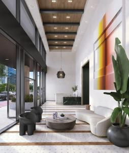 a living room with a couch and a table and chairs at Upscale Downtown Condo Pool Gym & Skyline Views in Miami +67 photos