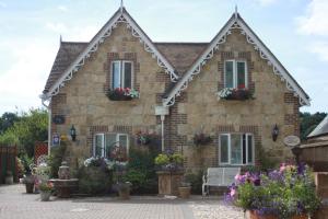 Κήπος έξω από το Koala Cottage