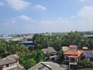 an overhead view of a city with houses and trees at Oceanway Residences in Wattala +5 photos