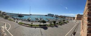 a view of a marina with boats in the water at Emy Suites in Civitavecchia