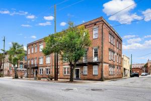 an old brick building on a city street at Haint & Porcelain in Savannah