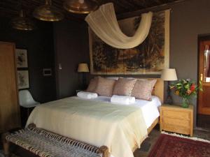 A bed or beds in a room at Kukama's Rest at Zebula 317