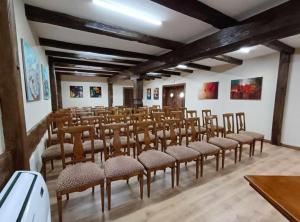 a room with a bunch of chairs in it at Jurjevec Castle in Brežane Lekeničke +138 photos