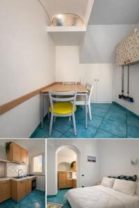 a small apartment with a table and a bed at In centro - De Jusola apartment in Maiori +6 photos