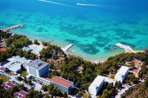 an aerial view of a beach and the ocean at hotel depandance Imperial Green by GLOBTOUR in Vodice +33 photos