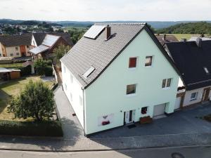 an overhead view of a white house with skylights at Ferienwohnung Wanderlust in Marsberg