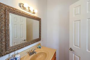 a bathroom with a sink and a mirror at Casa Sonora in Puerto Peñasco +8 photos