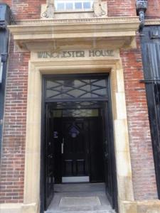 a entrance to a university building with a door at Doncaster City Centre Immaculate 1 Bedroom flat in Doncaster
