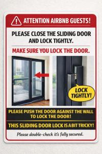 a sign that reads close the sliding door and lock tightly at Cedarstone Villa in Halswell