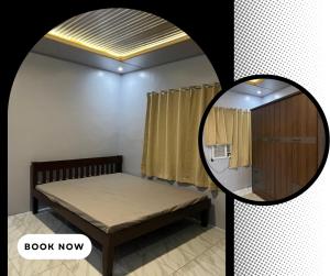 a small bedroom with a bed and a mirror at RobMar Haven in Sibulan +4 photos