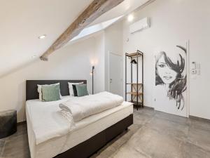 a bedroom with a large bed in a room at Mansion in Aywaille with sauna in Aywaille