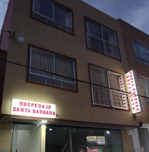 a building with a sign that reads hots epidemic santa barbara at Hospedaje Santa Barbara in Tabio
