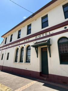 an old building with the words southern age hotel at Golden Age Hotel in Beaufort