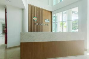a lobby of a taza imaging office in a building at Hotel Training Center UIN Mataram in Mataram