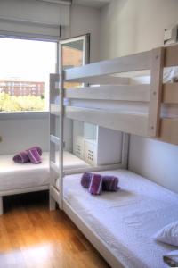 Cama o camas de una habitación en Barcelona Olympic Apartment 24 fotos más
