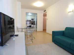 TV a/nebo společenská místnost v ubytování Apartamento Santa Fe