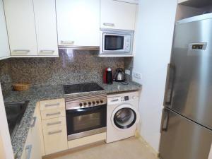 Kuchyň nebo kuchyňský kout v ubytování Apartamento Santa Fe
