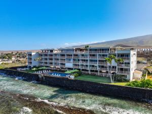 an aerial view of a hotel next to the water at Lahaina Roads 209 in Lahaina