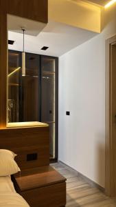a bedroom with a bed and a large mirror at Crown Mountain in 6th Of October +50 photos