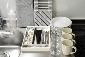 a kitchen counter with utensils and a sink at Anecis笠取町1 in Nagoya +43 photos