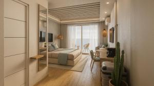 a bedroom with a bed and a living room at Dimora Blu Maldives in Dharavandhoo